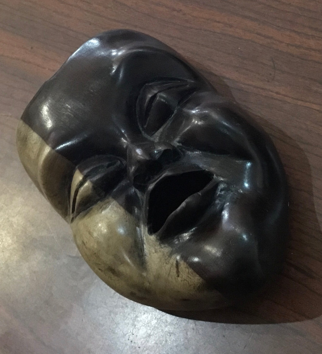Ebony carved face mask