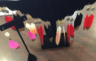 Gold tip feather earrings